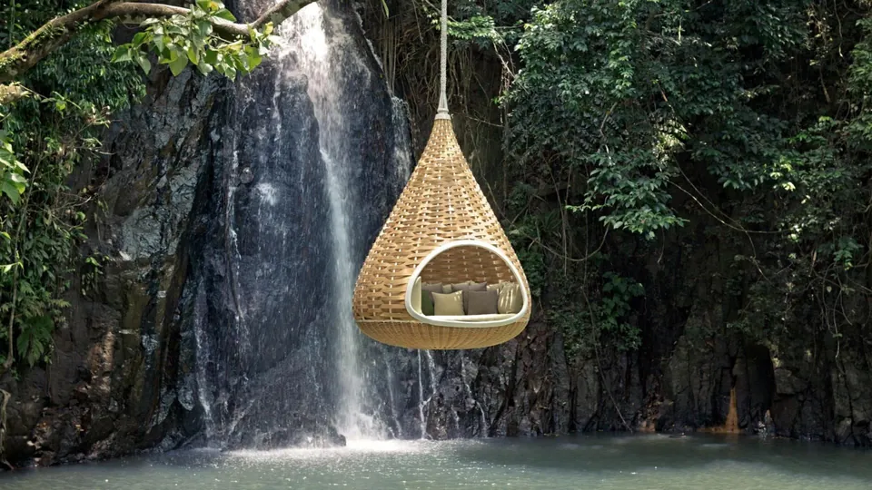 Dedon Nestrest hanging lounger in Natural Dedon Fiber, woven outdoor furniture