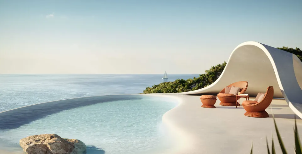 Dedon Papyon wing chair in Nectar, an outdoor lounge chair woven in layered Dedon Fiber