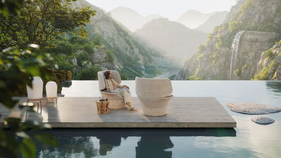 Dedon Seashell Grand wing chair, a woven outdoor lounge chair with footstool